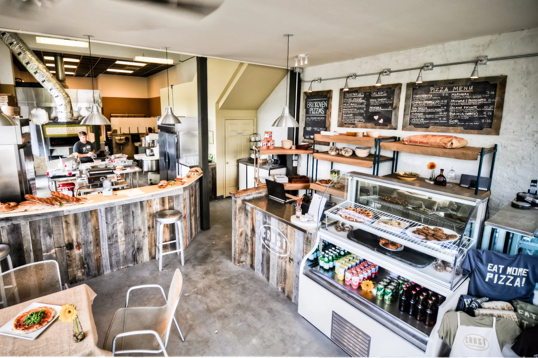 The open kitchen and dining room at Crust Artisan Bakery