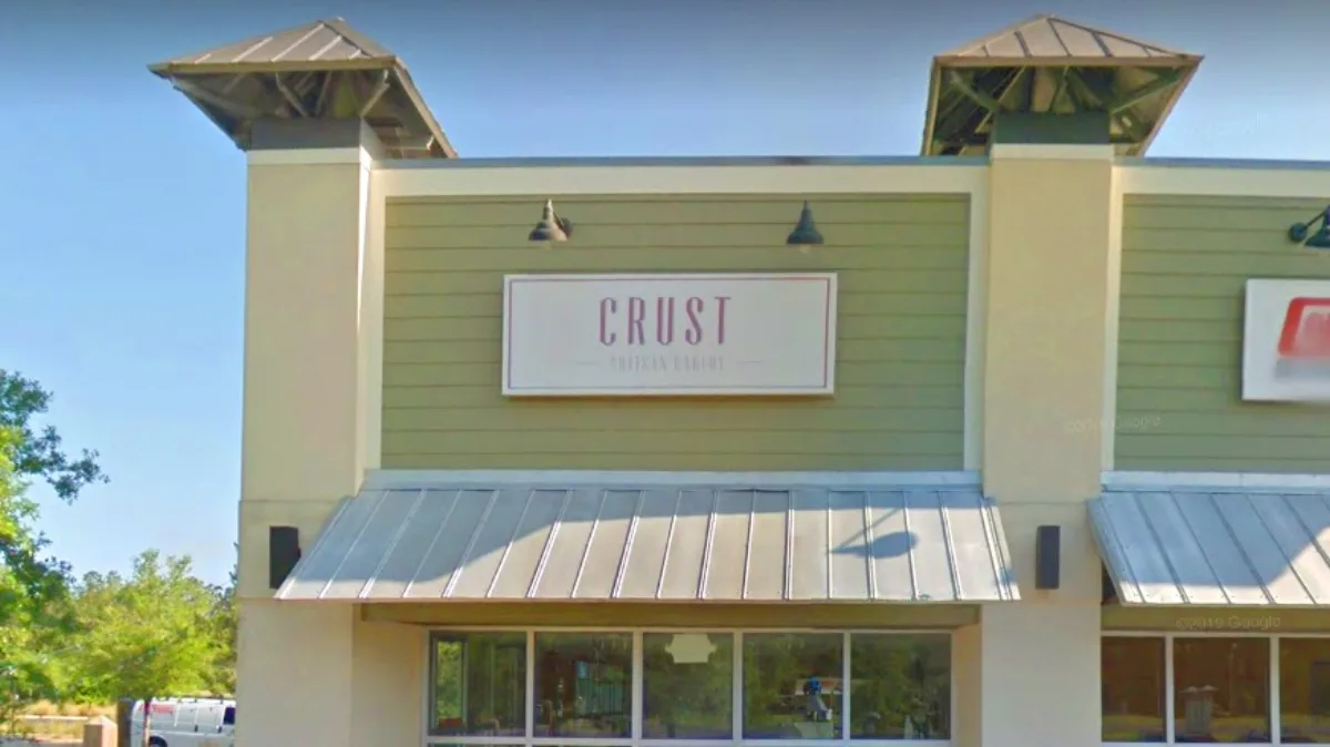 Crust Artisan Bakery storefront on US 98